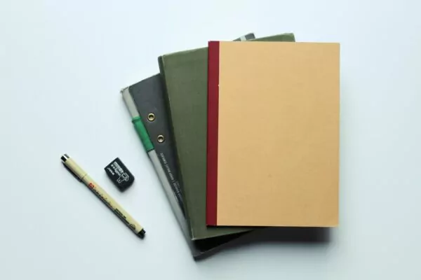 orange folder on black leather wallet